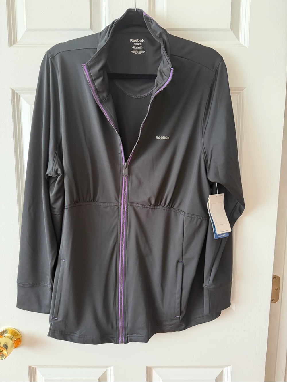 Reebok Women’s Black Utility Jacket with Purple Trim